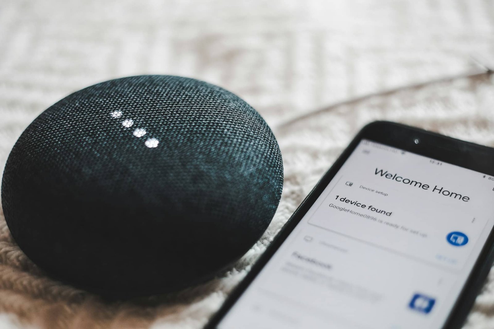Google Home Mini and smartphone Charcoal Google Home Mini and smartphone
